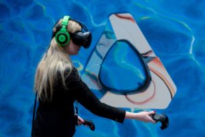 A visitor tests the new 'Vive steam VR' virtual device at the HTC stand on the second day of the Mobile World Congress in Barcelona on February 23, 2016. The world's biggest mobile fair, held from February 22 to February 25. / AFP / JOSEP LAGO        (Photo credit should read JOSEP LAGO/AFP/Getty Images)