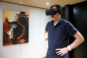A man plays a video game with the Oculus Rift VR headset at the E3 Electronic Expo in Los Angeles, California, U.S. on June 14, 2016. REUTERS/Lucy Nicholson/File Photo