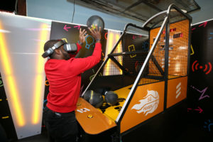 BURBANK, CALIFORNIA - JUNE 22: Guests experience the Ericsson: Arcade Games demo at AT&T SHAPE at Warner Bros. Studios on June 22, 2019 in Burbank, California. (Photo by Phillip Faraone/Getty Images for AT&T)