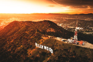 Los Angeles, California, USA - March 23, 2016: Aerial view of the Hollywood sign at dusk in Los Angeles. The image has been taken from an helicopter flying over LA.